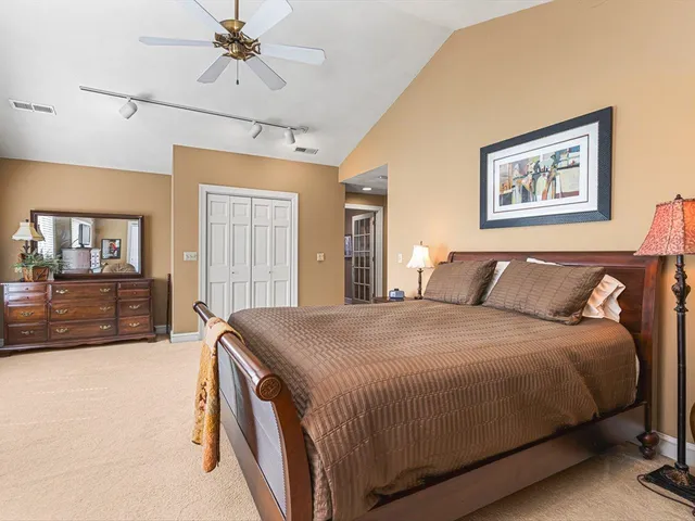 a living room with furniture fireplace and a flat screen tv