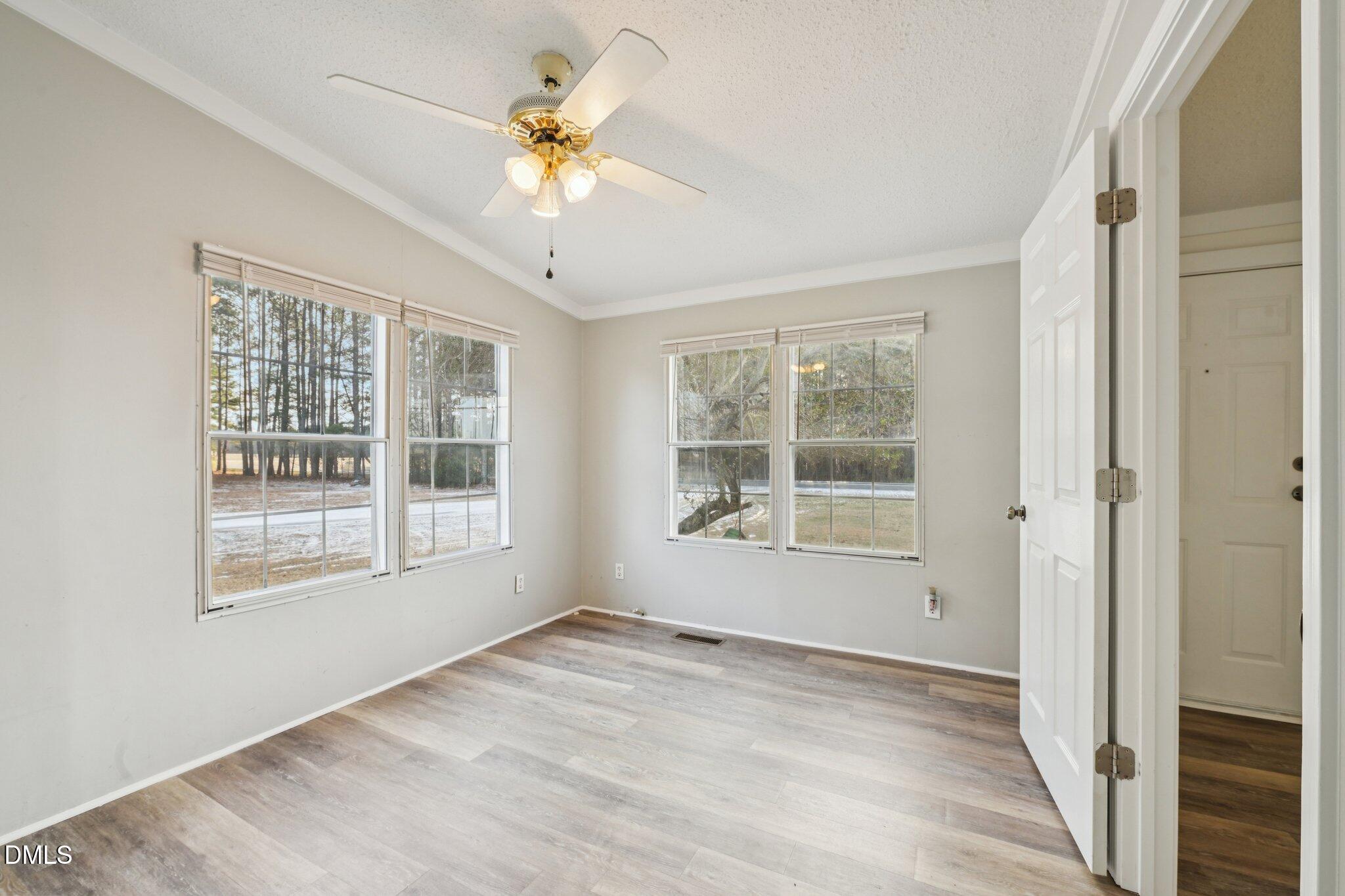 5393 Frazier Road Spring Hope, NC 27882 - Photo 13 of 23 a view of an empty room with a window