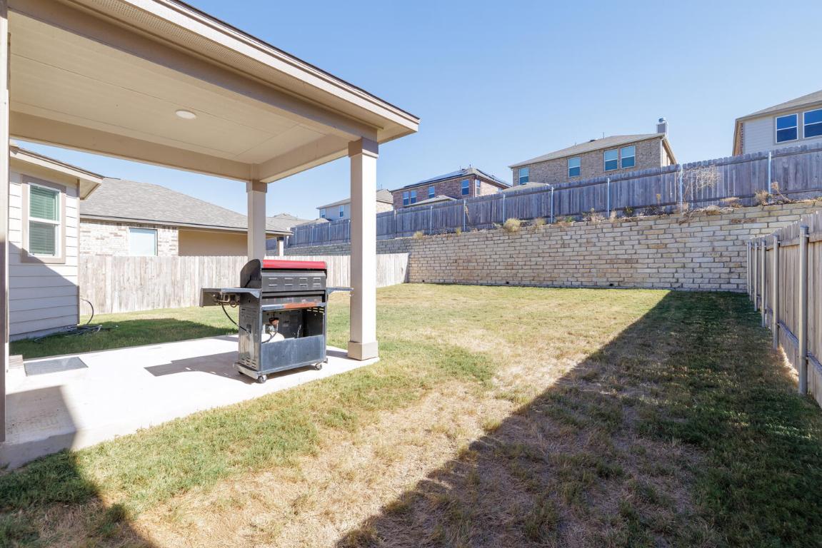 4641 Alfano Loop Round Rock, TX 78665 - Photo 30 of 32 a view of a living room and a fireplace