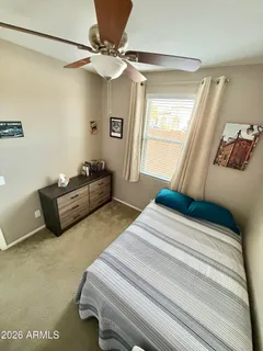 a living room with a couch and a flat screen tv