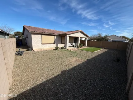 a house with trees in the background
