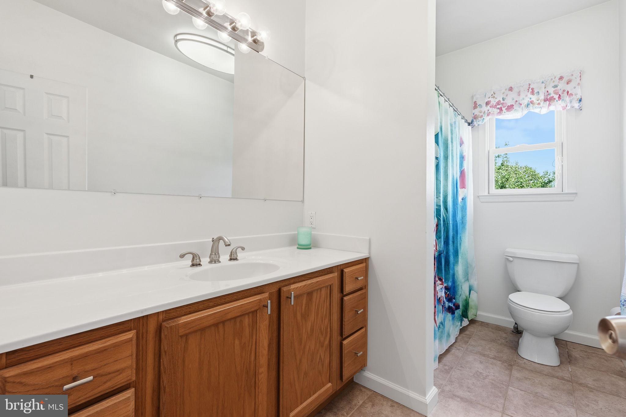 8418 Geneva Road Pasadena, MD 21122 - Photo 18 of 39 Full Bathroom Upper Level