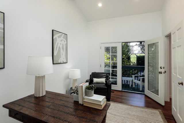 a living room with furniture lamp and lamp