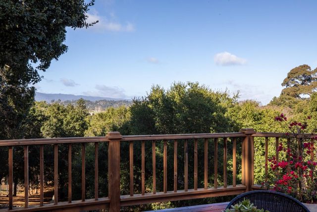 a front view of house with yard nad seating space