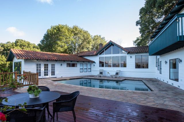 a view of a tree with a yard