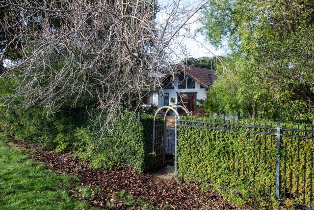 a view of street with parked cars