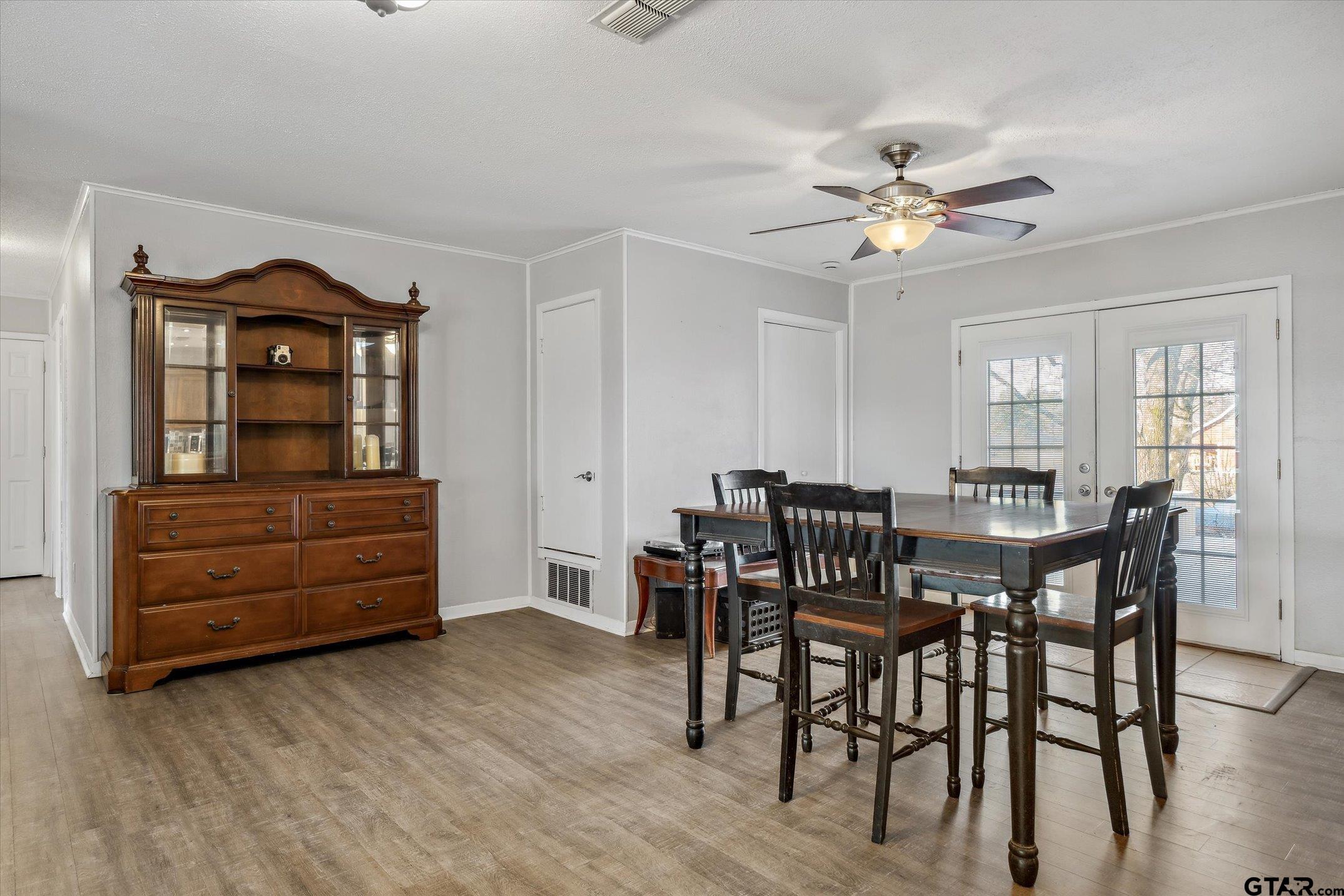 542 South Houston Street Edgewood, TX 75117 - Photo 14 of 37 a view of a dining room with furniture and window