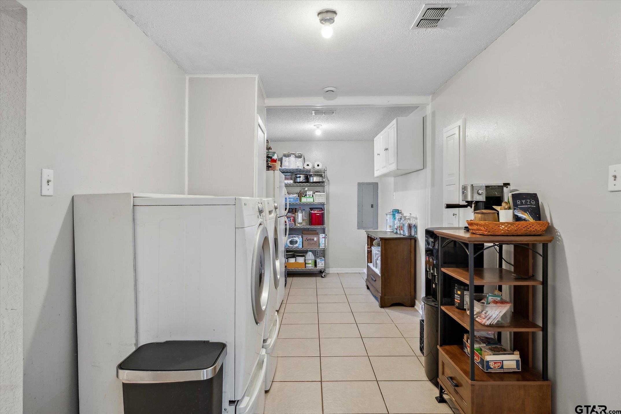542 South Houston Street Edgewood, TX 75117 - Photo 26 of 37 a room with storage and utility
