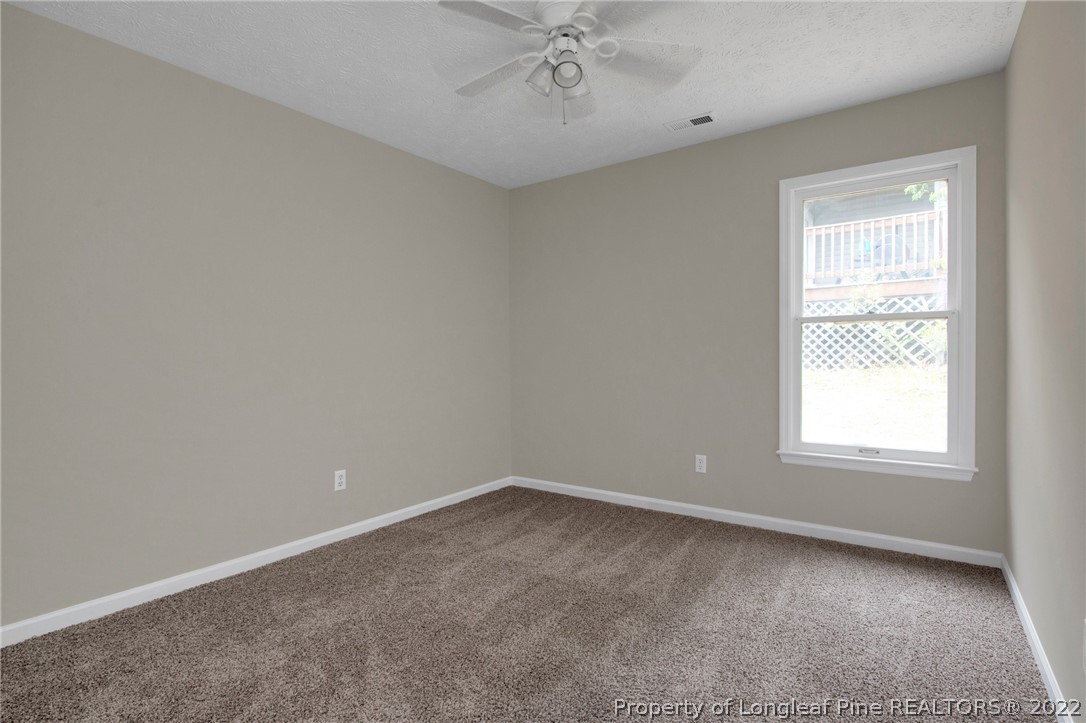512 Andover Road Fayetteville, NC 28311 - Photo 15 of 18 an empty room with a window