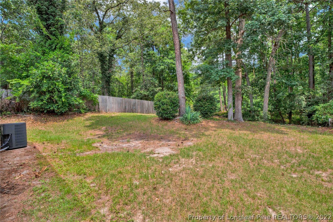 512 Andover Road Fayetteville, NC 28311 - Photo 18 of 18 a view of a yard with trees