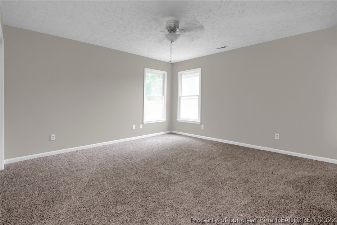512 Andover Road Fayetteville, NC 28311 - Photo 10 of 18 a view of an empty room with a window
