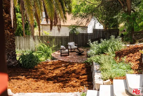 a view of garden with patio