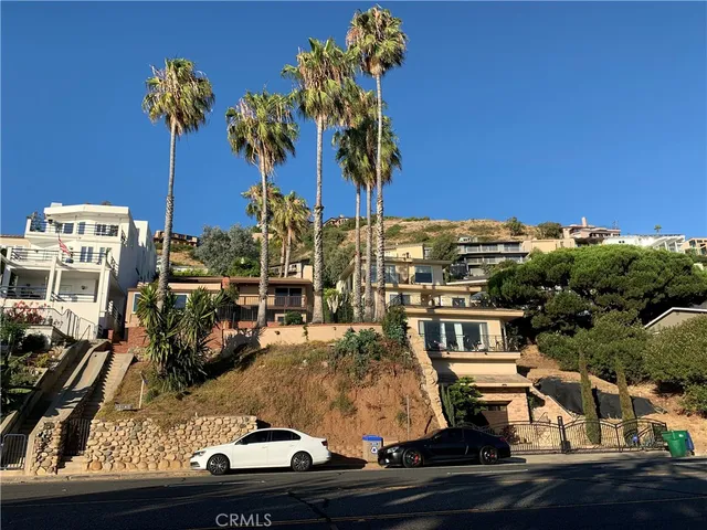 a view of houses with an outdoor space and seating