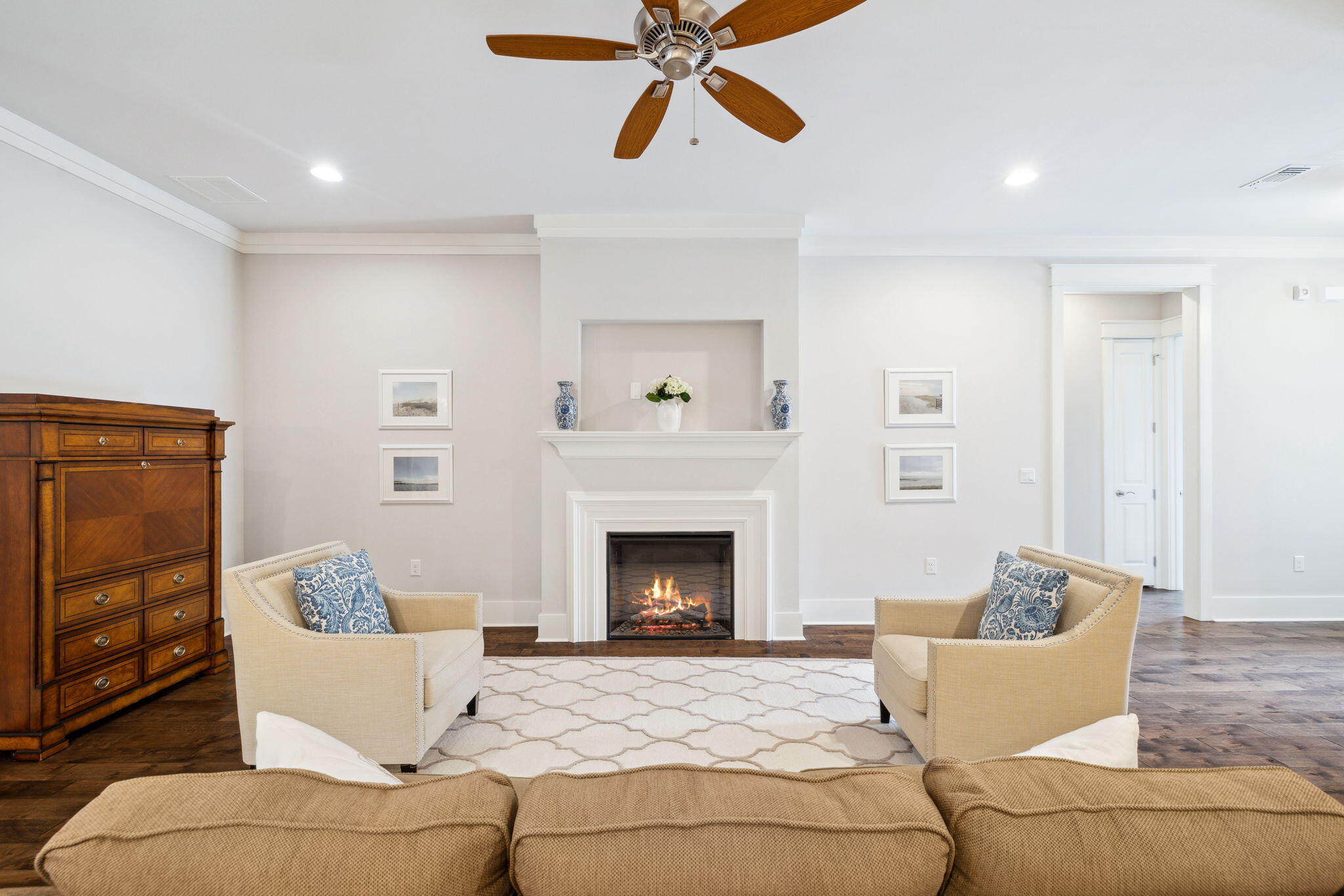 180 Blakely Drew Boulevard Santa Rosa Beach, FL 32459 - Photo 11 of 40 a living room with furniture and a fireplace
