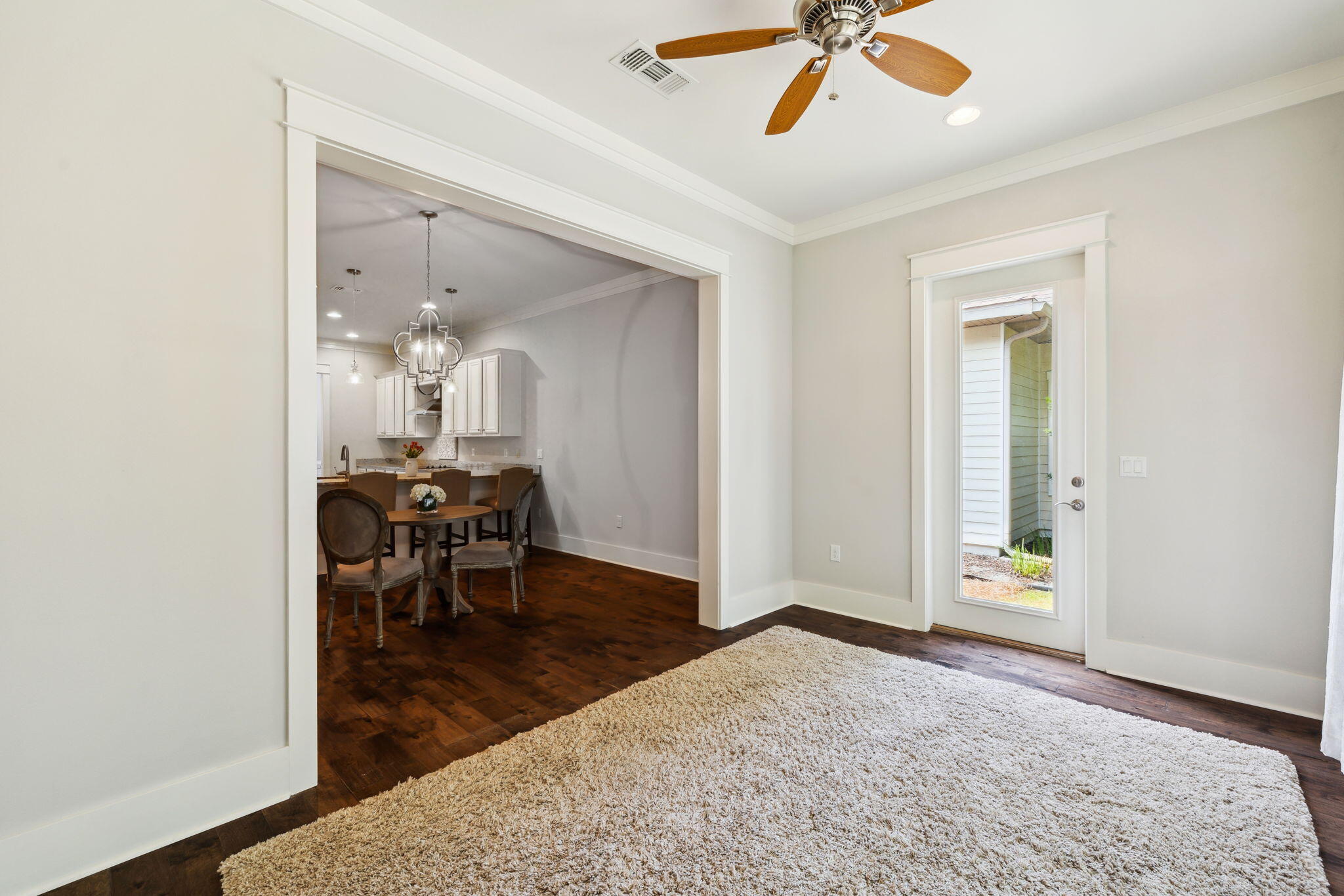 180 Blakely Drew Boulevard Santa Rosa Beach, FL 32459 - Photo 22 of 40 wooden floor with a chandelier in a room