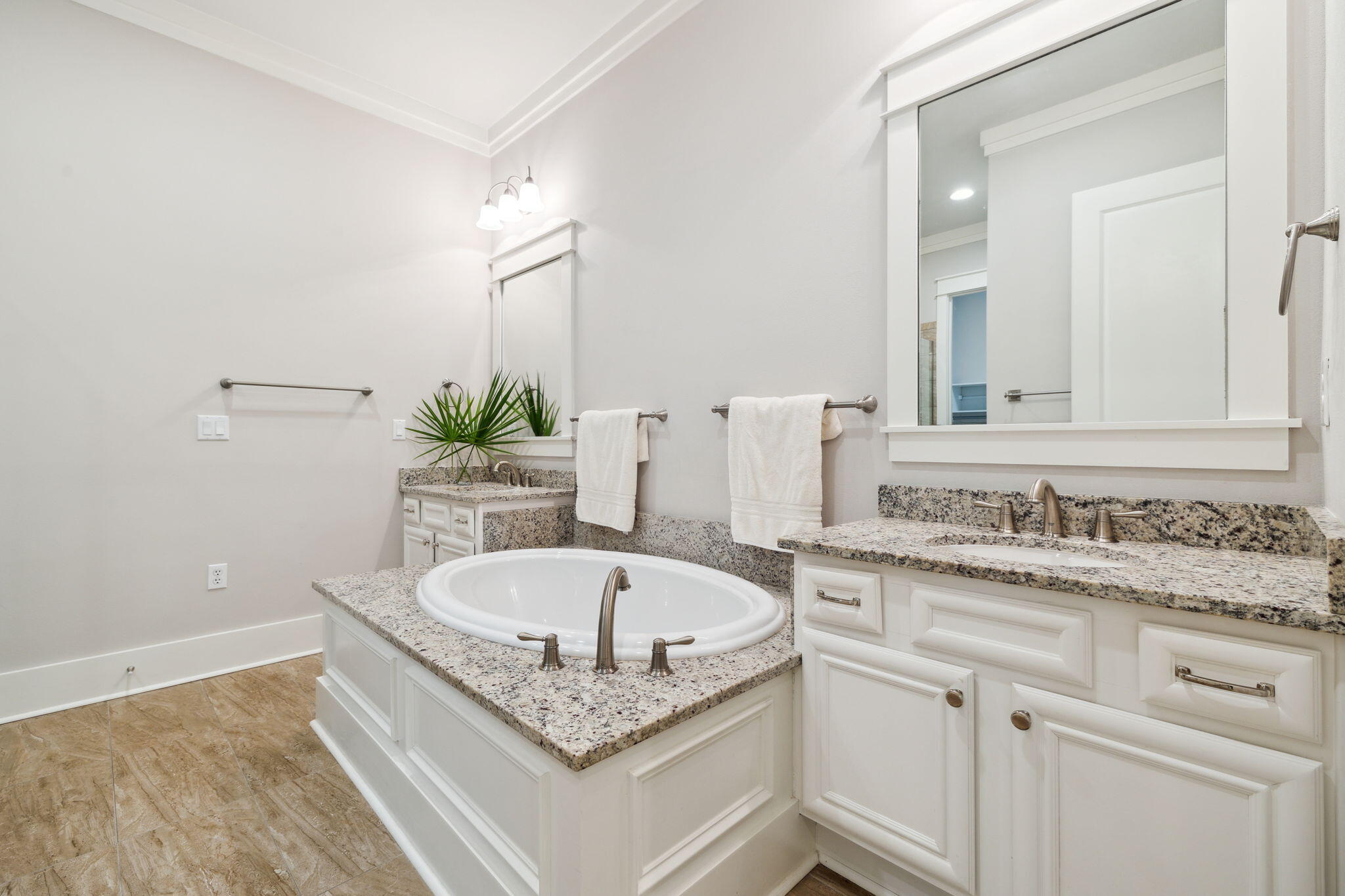 180 Blakely Drew Boulevard Santa Rosa Beach, FL 32459 - Photo 27 of 40 a bath tub sitting in a bathroom sink