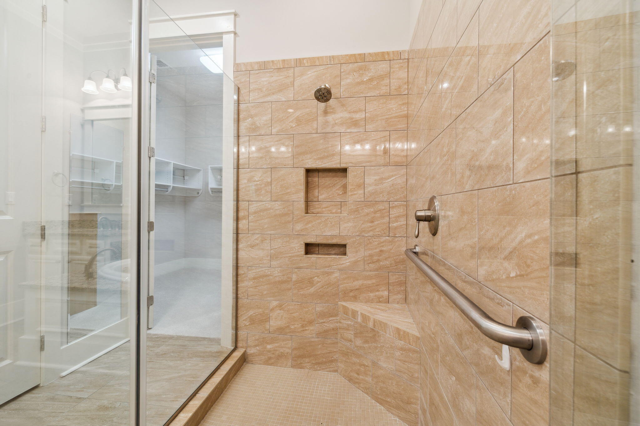 180 Blakely Drew Boulevard Santa Rosa Beach, FL 32459 - Photo 29 of 40 a bathroom with a glass shower door