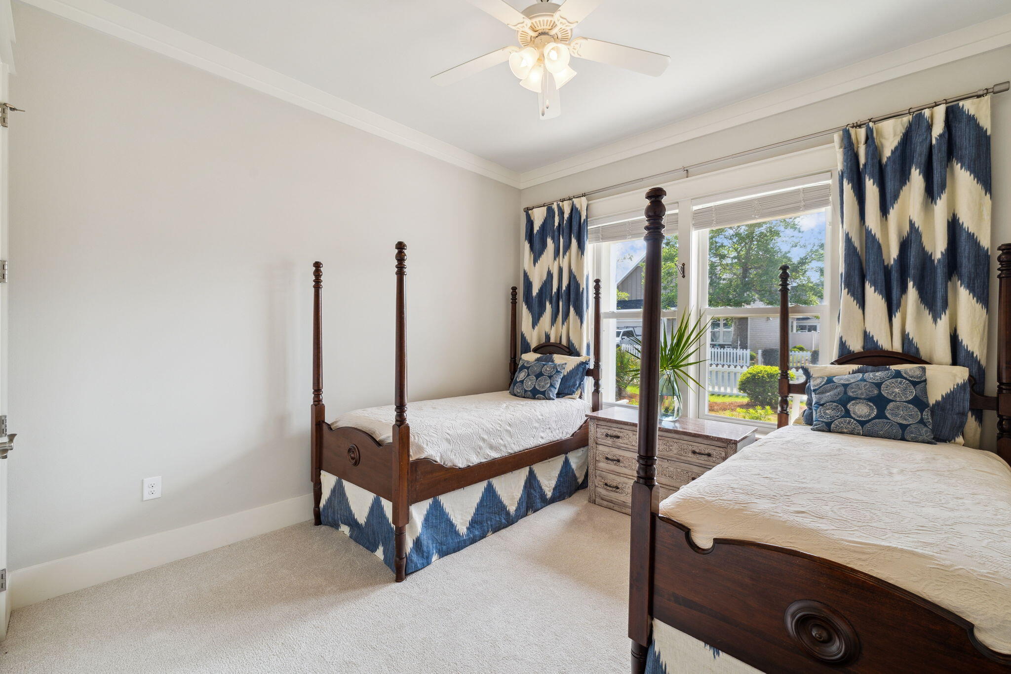 180 Blakely Drew Boulevard Santa Rosa Beach, FL 32459 - Photo 31 of 40 a bedroom with furniture and a large window