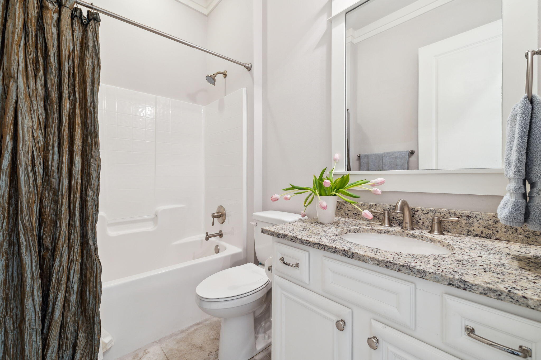 180 Blakely Drew Boulevard Santa Rosa Beach, FL 32459 - Photo 33 of 40 a bathroom with a granite countertop sink a toilet and shower