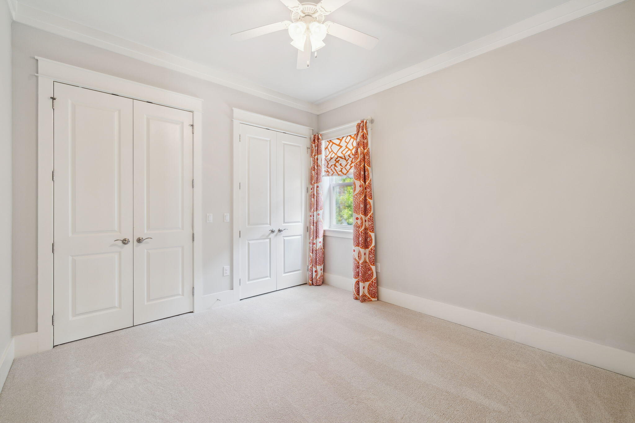 180 Blakely Drew Boulevard Santa Rosa Beach, FL 32459 - Photo 34 of 40 a view of an empty room and a ceiling fan