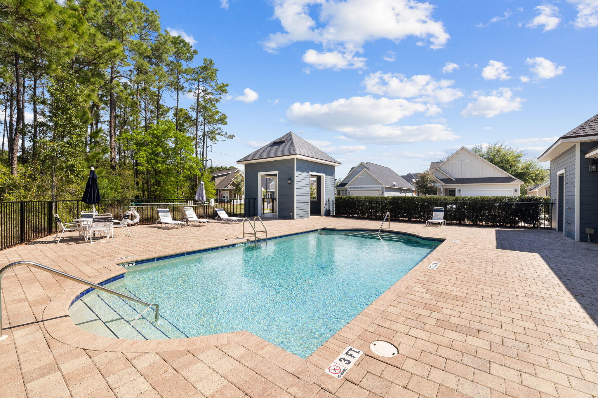 180 Blakely Drew Boulevard Santa Rosa Beach, FL 32459 - Photo 38 of 40 a view of a house with swimming pool and sitting area