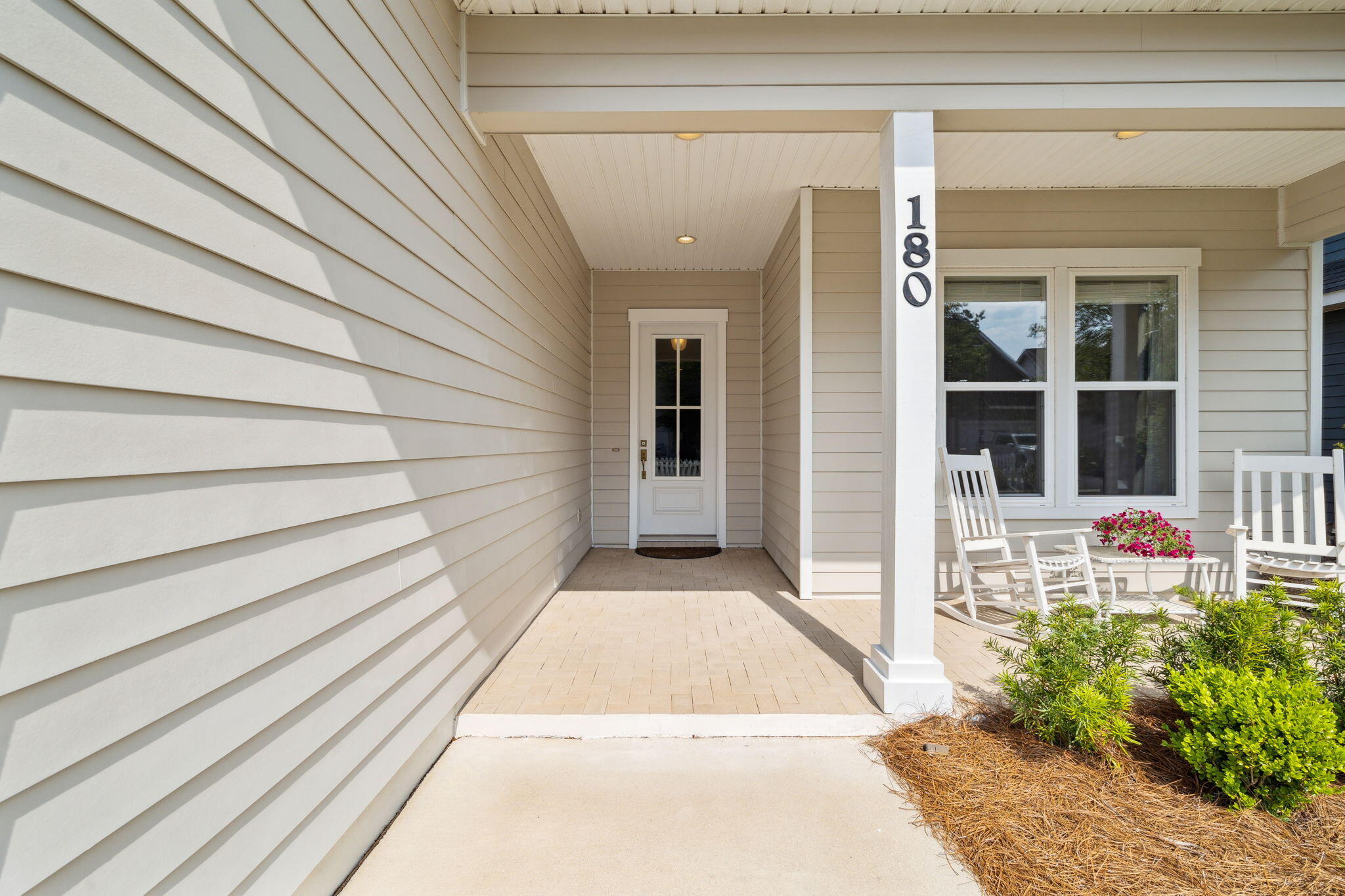 180 Blakely Drew Boulevard Santa Rosa Beach, FL 32459 - Photo 6 of 40 a view of a house with a door and porch