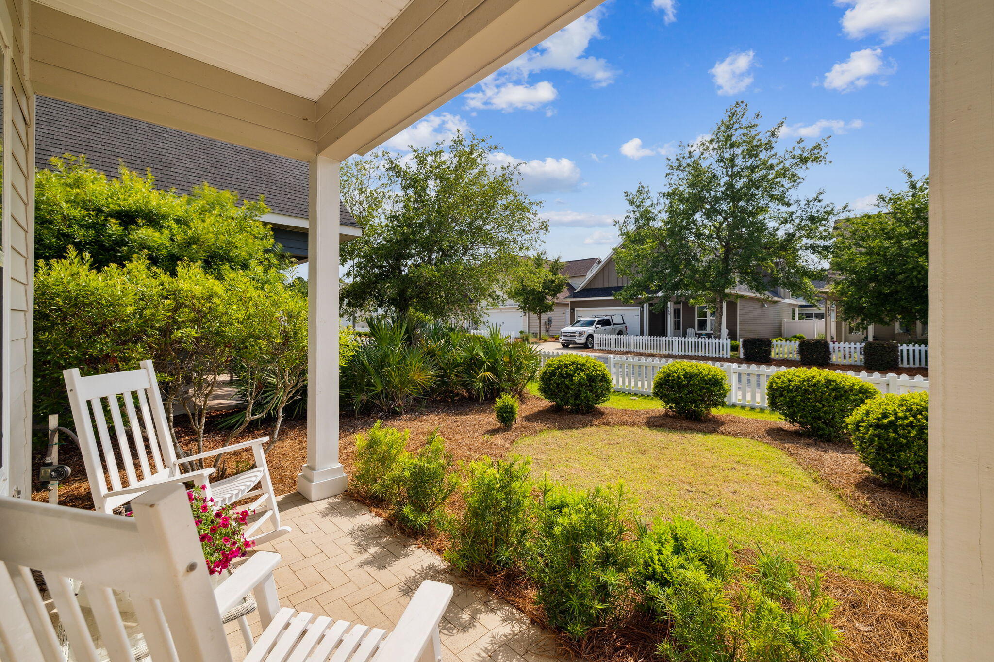 180 Blakely Drew Boulevard Santa Rosa Beach, FL 32459 - Photo 7 of 40 a view of a backyard with garden and patio