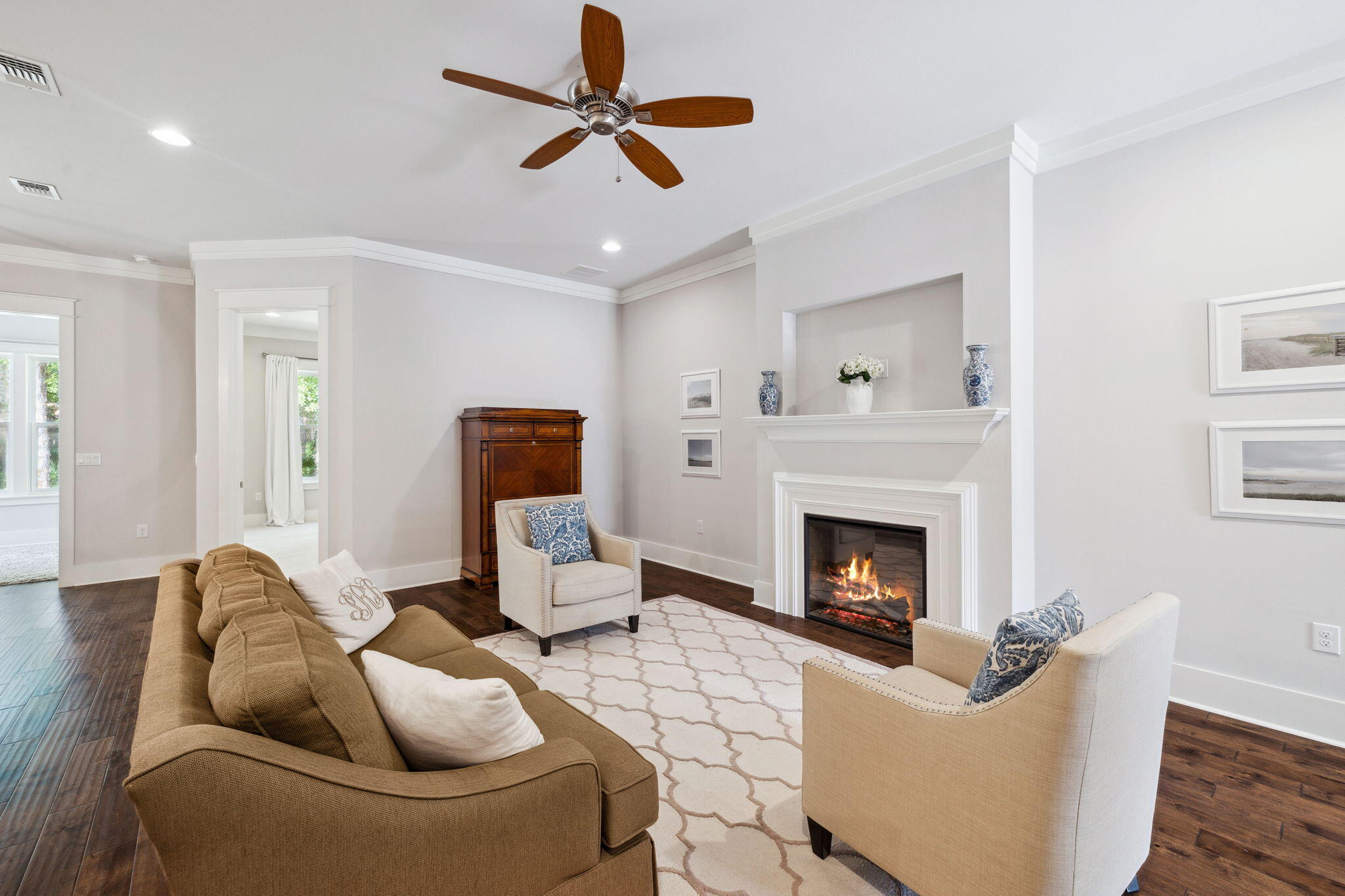 180 Blakely Drew Boulevard Santa Rosa Beach, FL 32459 - Photo 10 of 40 a living room with furniture and a fireplace