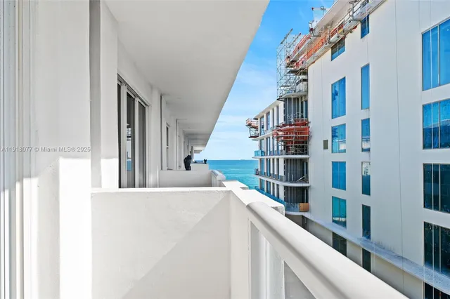 a view of a living room with furniture