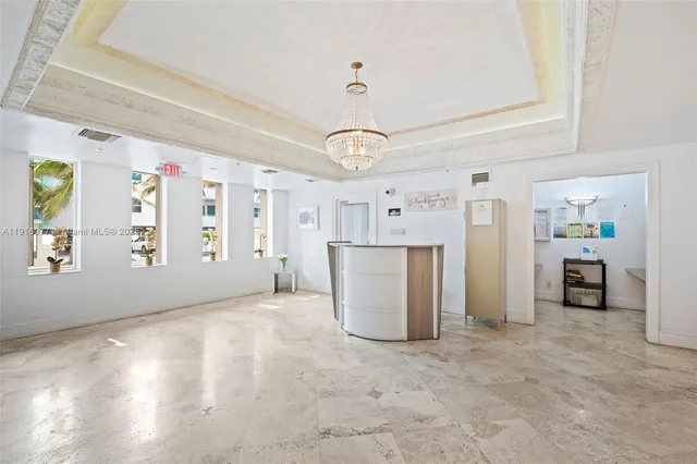 a view of a livingroom with furniture and window