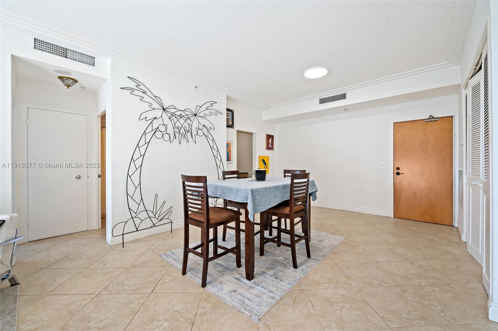 9195 Collins Avenue, Unit PH14 Surfside, FL 33154 - Photo 5 of 26 a view of a dining room with furniture