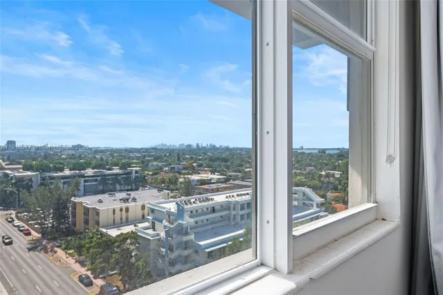 a view of a lake from a balcony