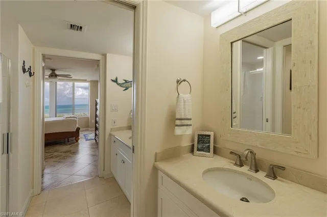 a bathroom with a toilet shower and a sink