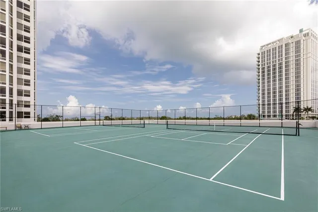 a room with gym equipment and a large window