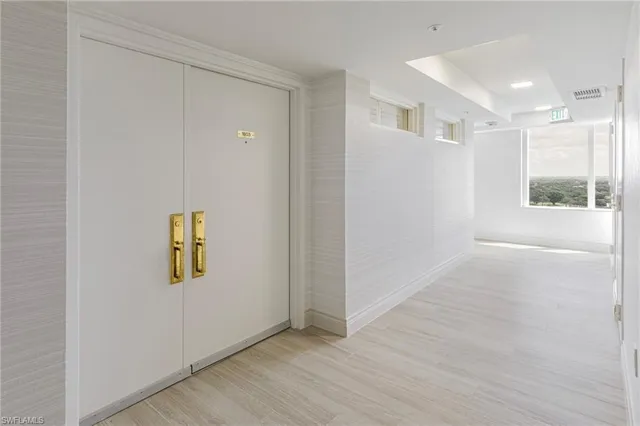 a view of an empty room and window