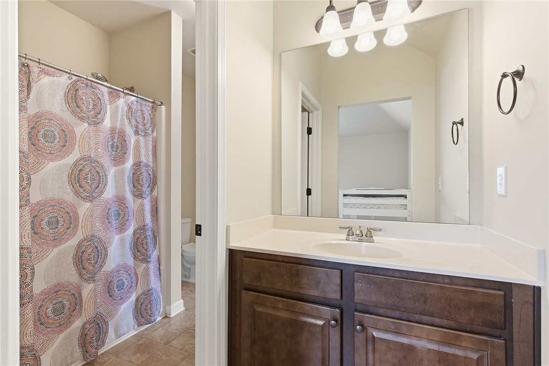 138 Buckland Drive Anderson, SC 29621 - Photo 37 of 49 This functional bathroom features a single vanity, a shower, and durable tile flooring for everyday convenience.