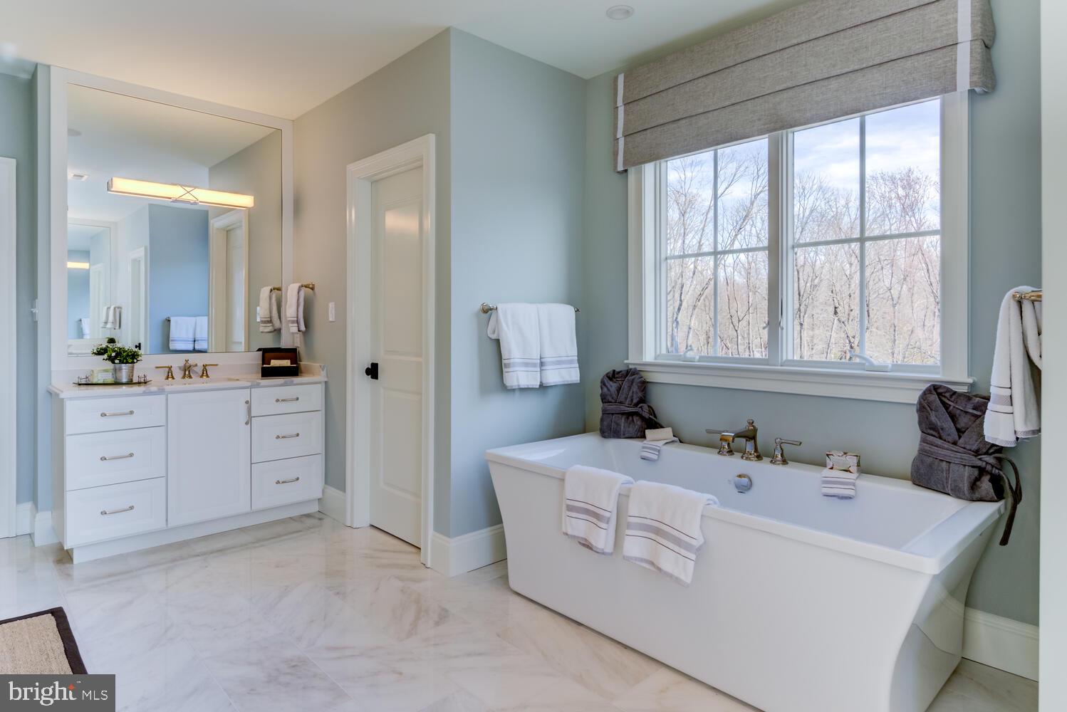 7 Old Covered Bridge Road Newtown Square, PA 19073 - Photo 25 of 45 a room with a bed cabinets and couch