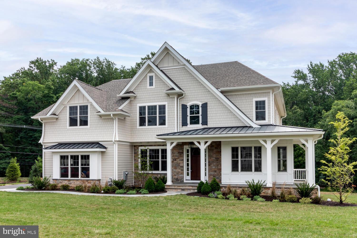 7 Old Covered Bridge Road Newtown Square, PA 19073 - Photo 3 of 45 a front view of a house with a yard