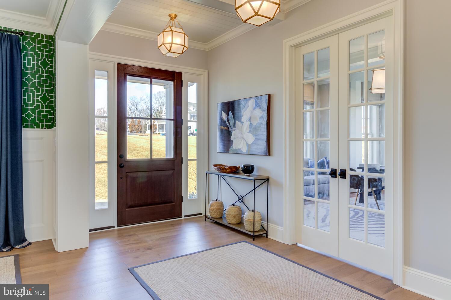 7 Old Covered Bridge Road Newtown Square, PA 19073 - Photo 4 of 45 an entryway with a door and wooden floor