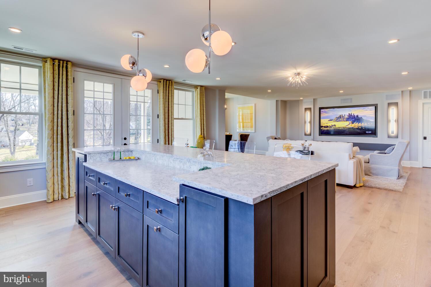 7 Old Covered Bridge Road Newtown Square, PA 19073 - Photo 42 of 45 a kitchen with center island a counter space a sink and living room