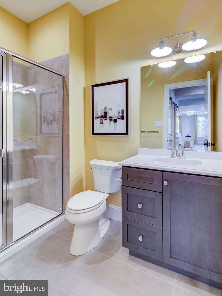 7 Old Covered Bridge Road Newtown Square, PA 19073 - Photo 44 of 45 a bathroom with a toilet sink and mirror