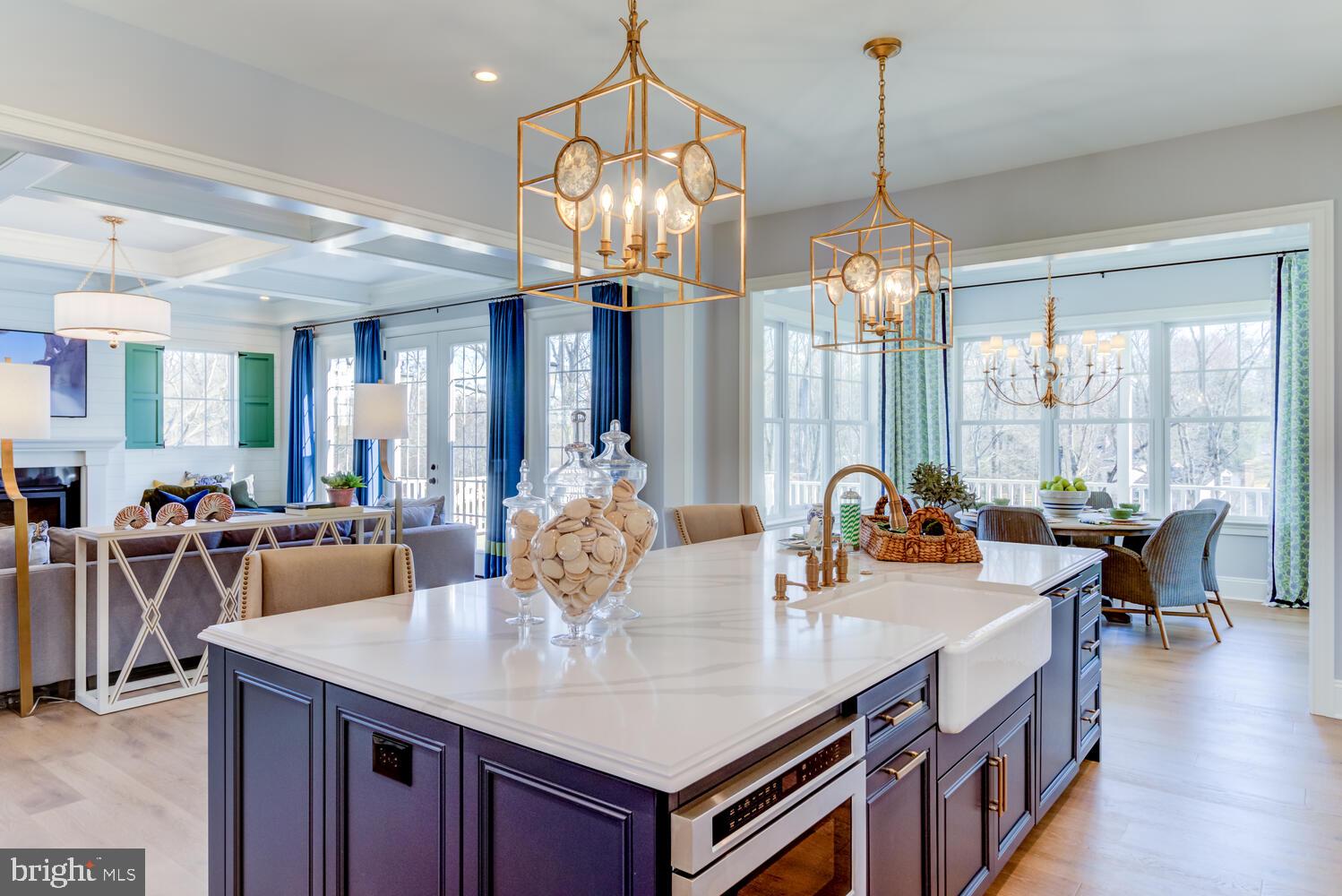 7 Old Covered Bridge Road Newtown Square, PA 19073 - Photo 10 of 45 a view of a dining room and livingroom with furniture wooden floor a chandelier