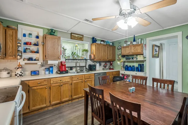 a bedroom with furniture and a flat tv screen
