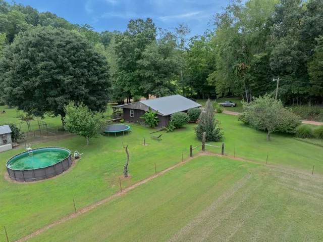 a view of a lake with a yard