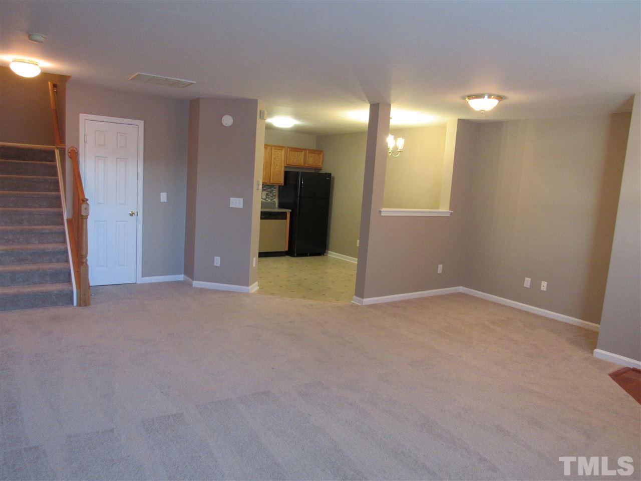 8620 Neuse Landing Lane, Unit 101 Raleigh, NC 27616 - Photo 4 of 16 a view of a big room with a bathroom