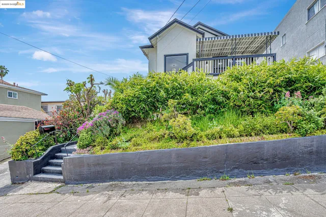 a house view with a garden space