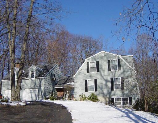 23 Arapaho Road Brookfield, CT 06804 - Photo 1 of 1 a front view of a house with a yard