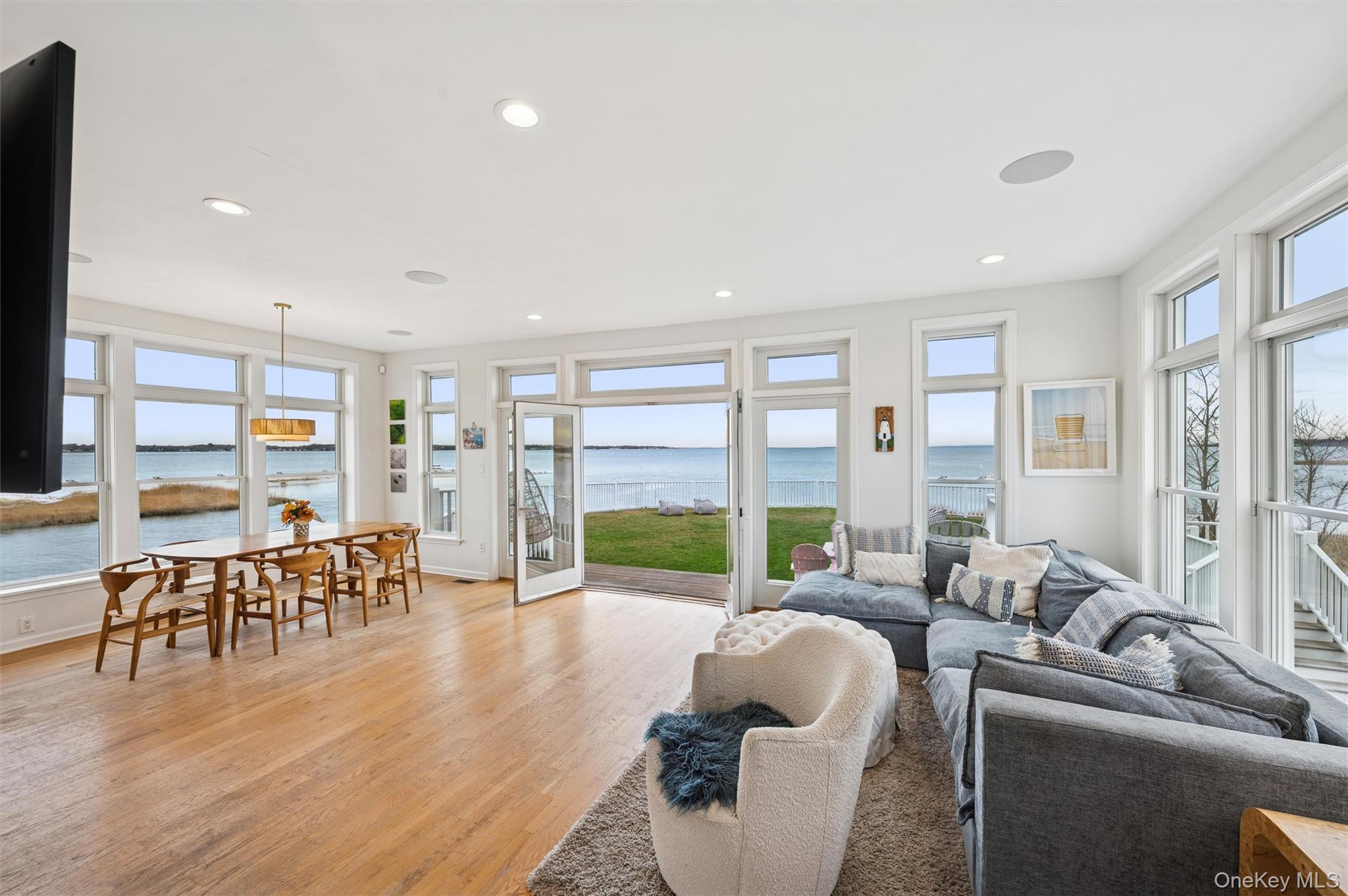 112 Pine Avenue Flanders, NY 11901 - Photo 25 of 29 a living room with furniture and a large window