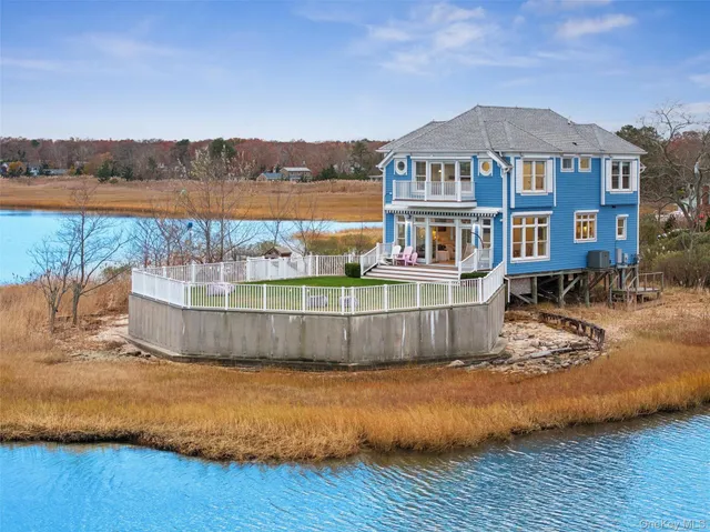 a view of a house with a ocean view