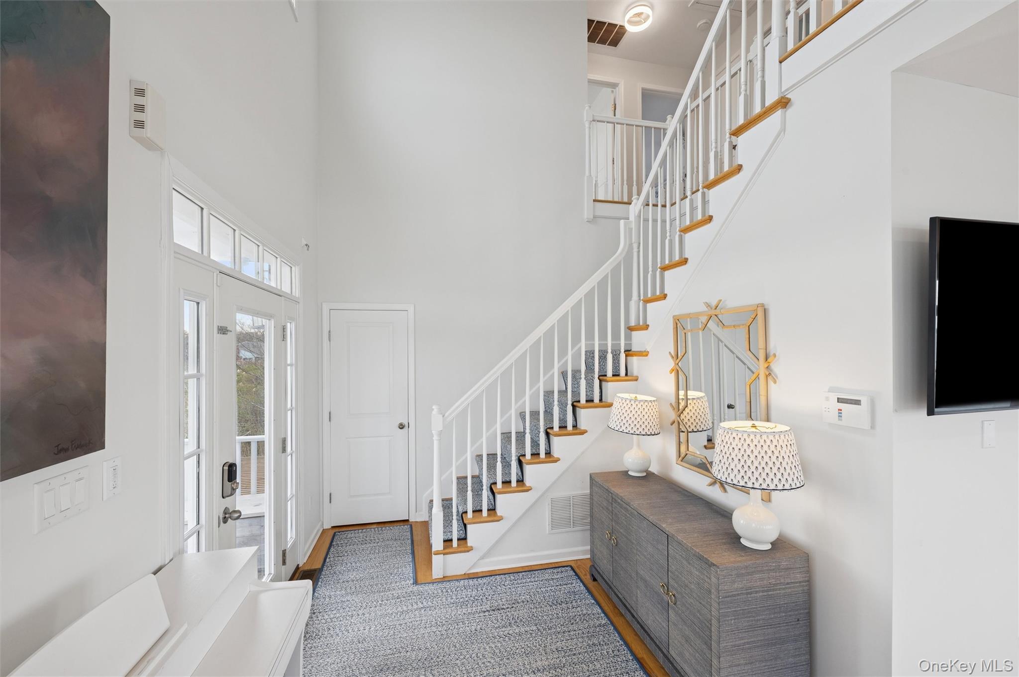 112 Pine Avenue Flanders, NY 11901 - Photo 8 of 29 a living room with furniture and a flat screen tv